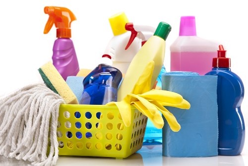 Cleaner reviewing booking details and access instructions for a flat cleaning appointment